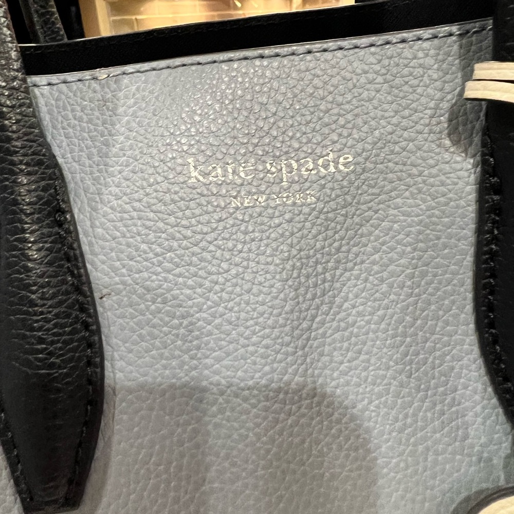 Kate Spade blue handbag with black trim